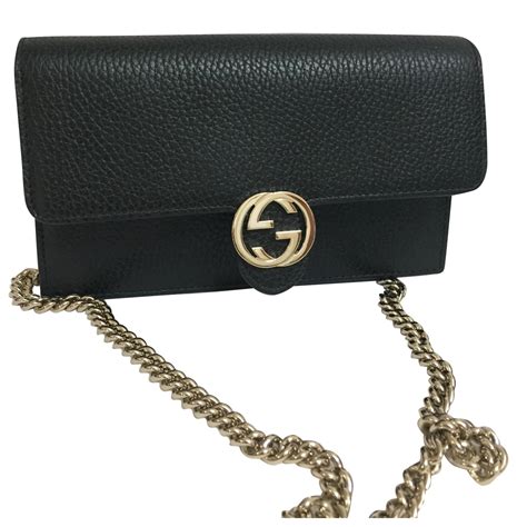 gucci black wallet on chain.